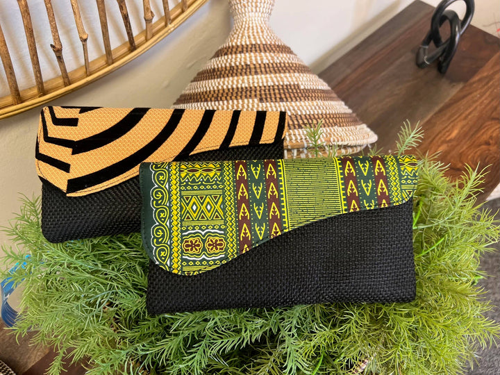 Handmade fair trade clutch purse with vibrant African fabric and eco-friendly upcycled materials.