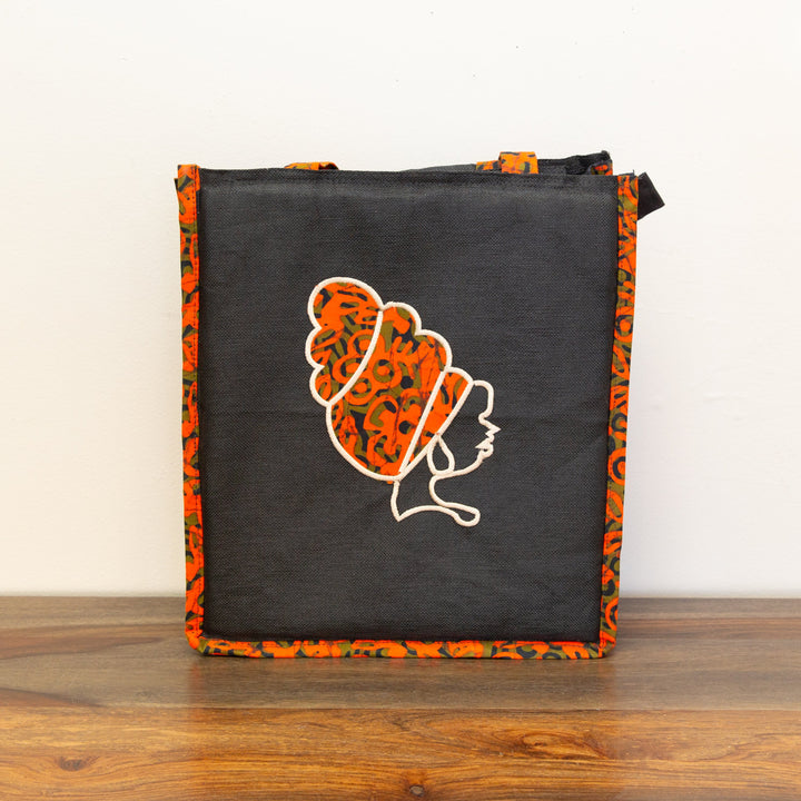 Assorted fair trade African print tote bags handmade by artisans in Kenya.