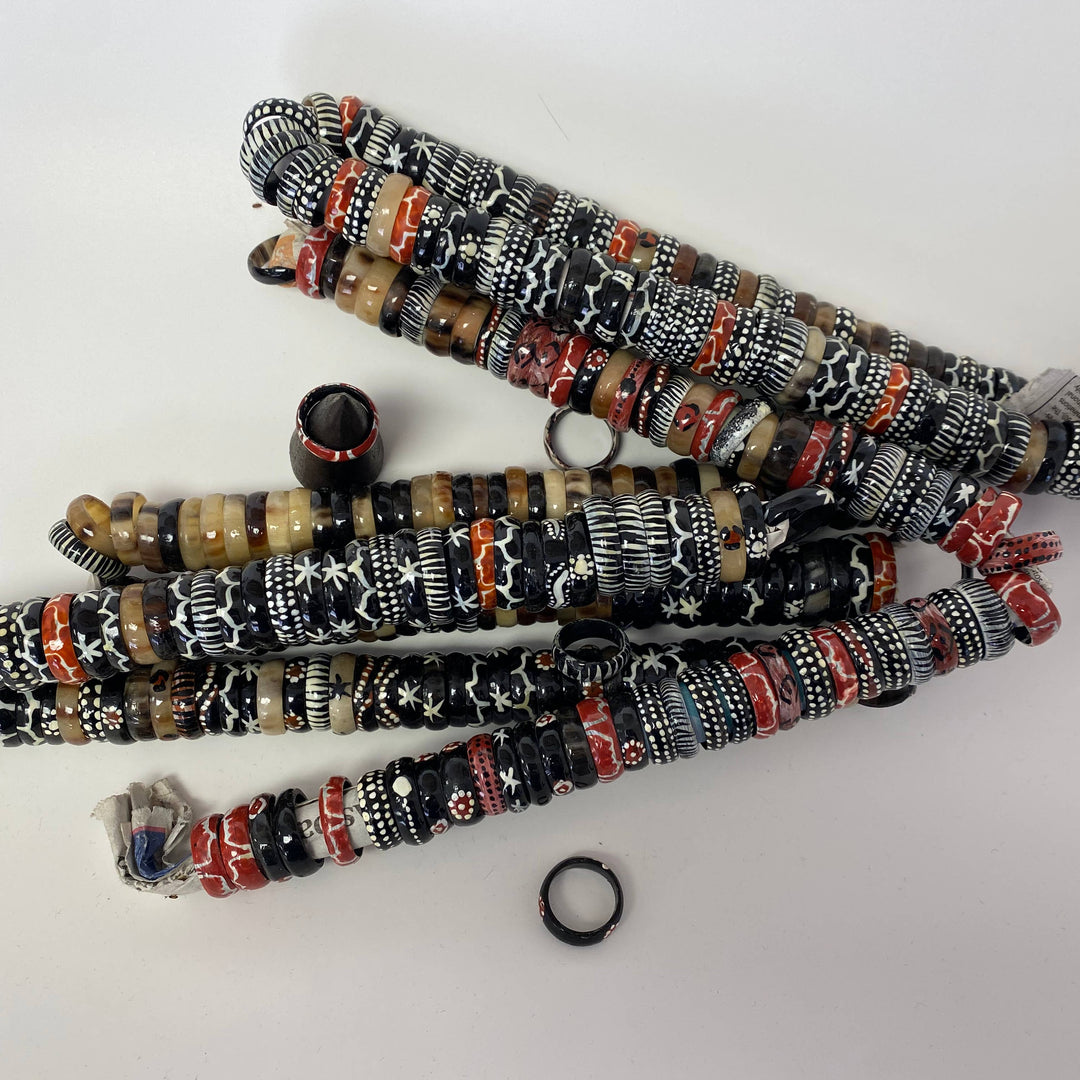 Up-cycled bone rings in black-and-white animal print.