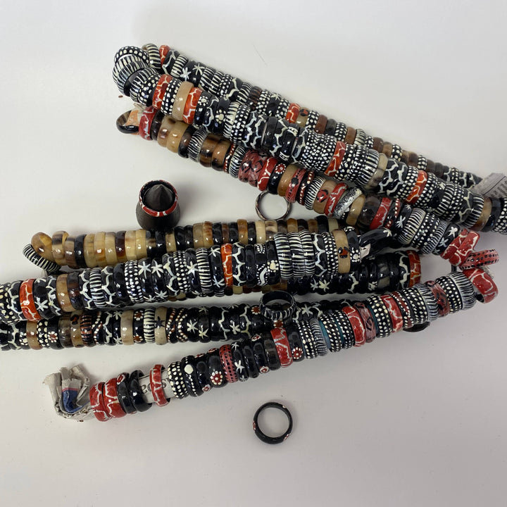 Up-cycled bone rings in black-and-white animal print.