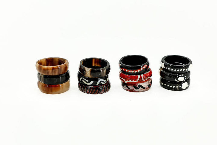 Assorted pack of twelve fair trade batiked bone rings.