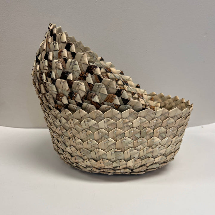 Eco-friendly woven catchall bowl with traditional Kenyan design and artisanal detail.