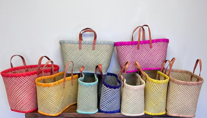 Colorful, vibrant, bold, checkered totes made of raffia and palm