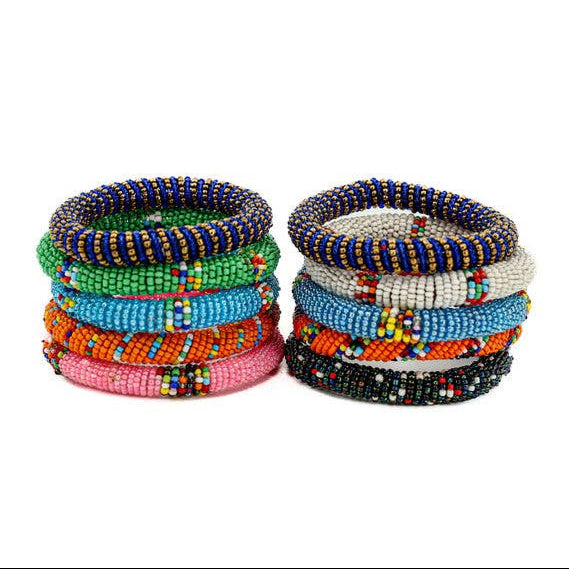 Vibrant Maasai stacking bracelets crafted with glass beads and traditional Kenyan techniques.