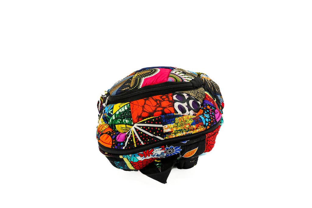 Handmade fair trade backpack with unique patchwork design, eco-conscious materials, and practical compartments, crafted in Kenya from up-cycled textiles.