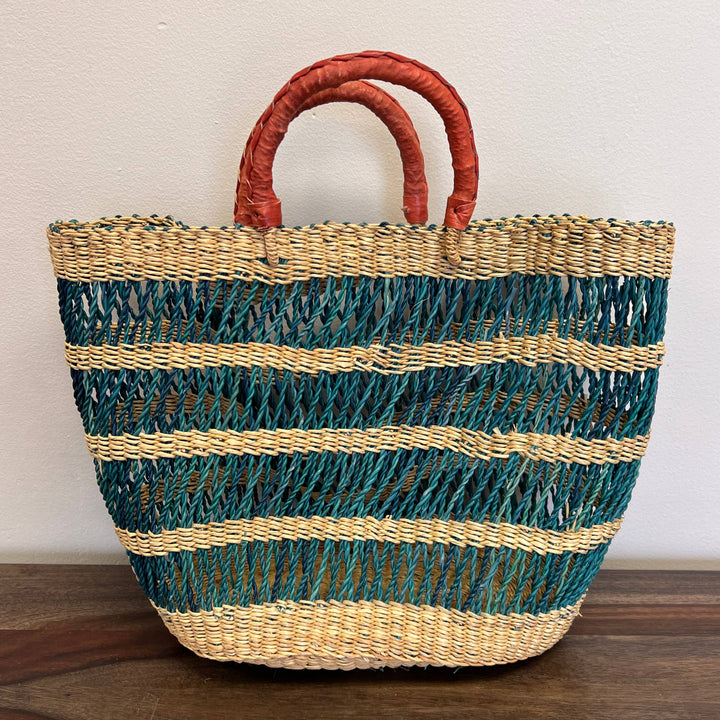 Sustainable lace weave shopping basket with artisan craftsmanship, perfect for the farmers market.

