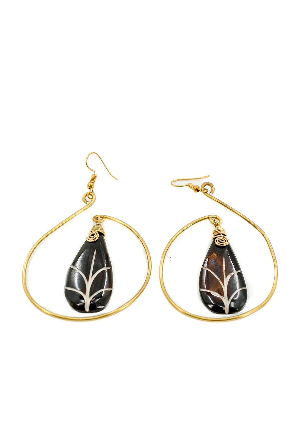 Unique fair trade bone and brass earrings, hand-batiked and hand-carved, with nickel and lead-free ear wires.