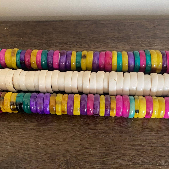 Handcrafted bright and multicolor fair trade bone rings.