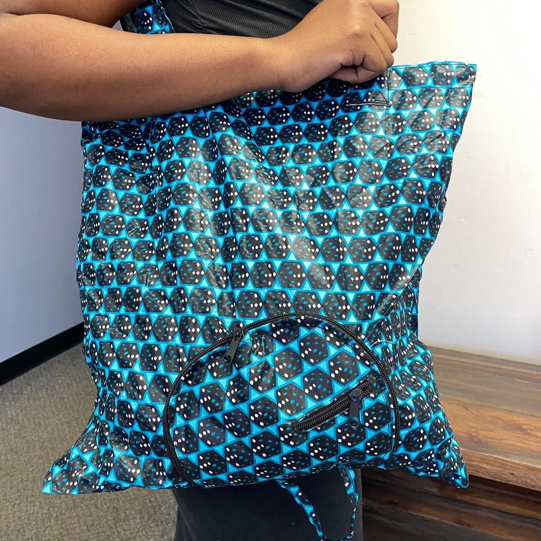 Handmade fabric tote bag with traditional African patterns.