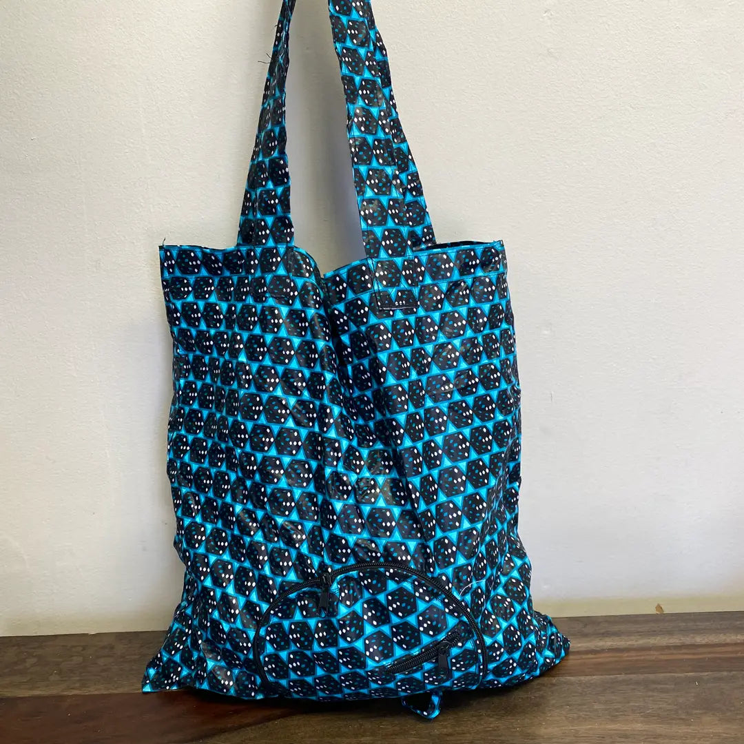Fair trade fabric tote bag with zipper closure, handmade by Rwandan artisans.
