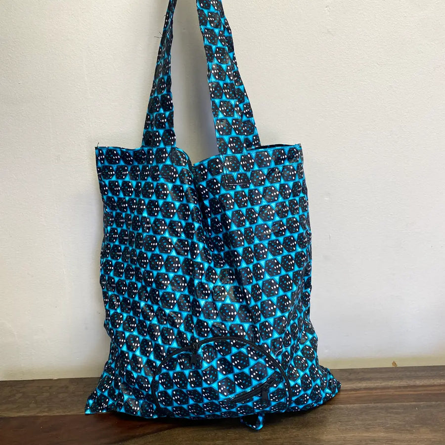 Fair trade fabric tote bag with zipper closure, handmade by Rwandan artisans.
