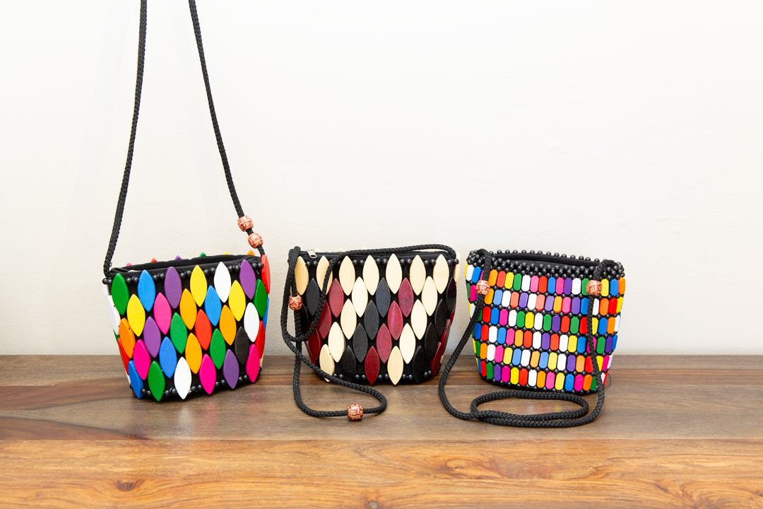 Crossbody, fairtrade, handbag made from up-cycled wood by African artisans.