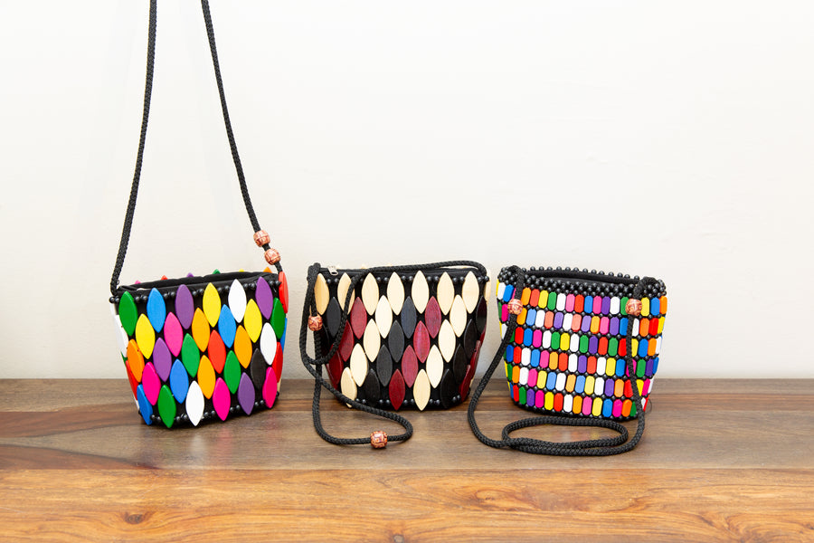 Crossbody, fairtrade, handbag made from up-cycled wood by African artisans.