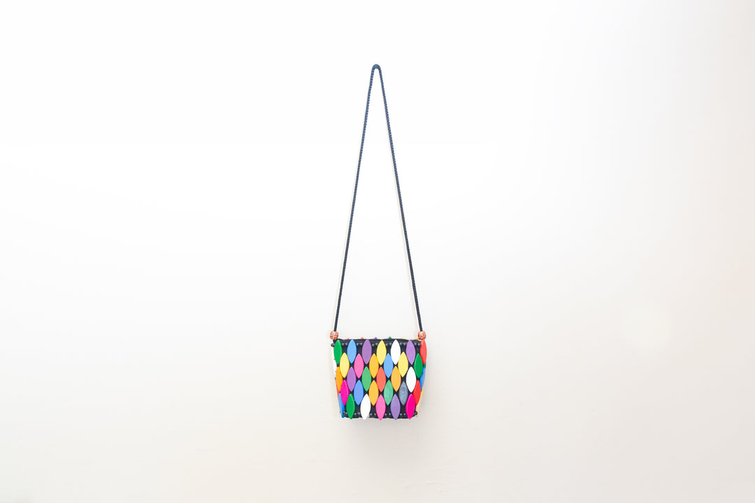 Cute and colorful crossbody bag, handmade by artisans in Africa.