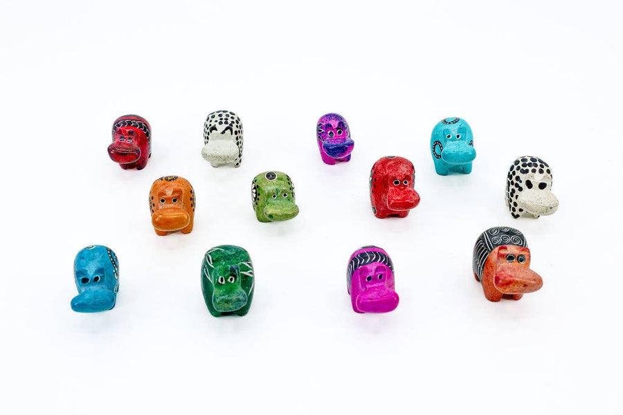 Ethical home decor featuring assorted soapstone hippos.