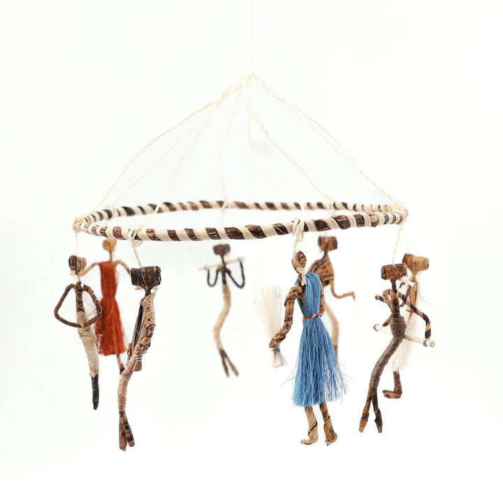Fair trade dancer mobile made from banana leaf and sisal.