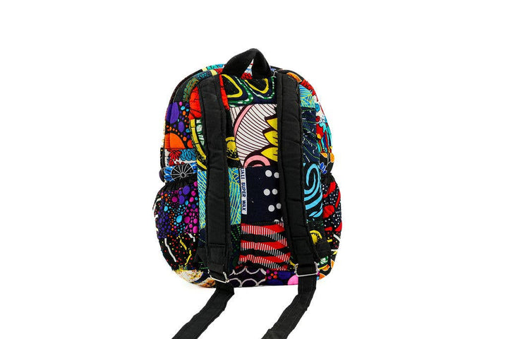 Sustainable Kenyan patchwork backpack with colorful remnant fabric, fair trade certified, ideal for travel, casual use, and ethical gift giving.