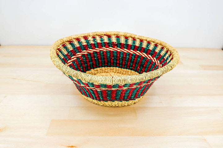 Extra-deep fair trade basket displayed on tabletop filled with fresh fruit.