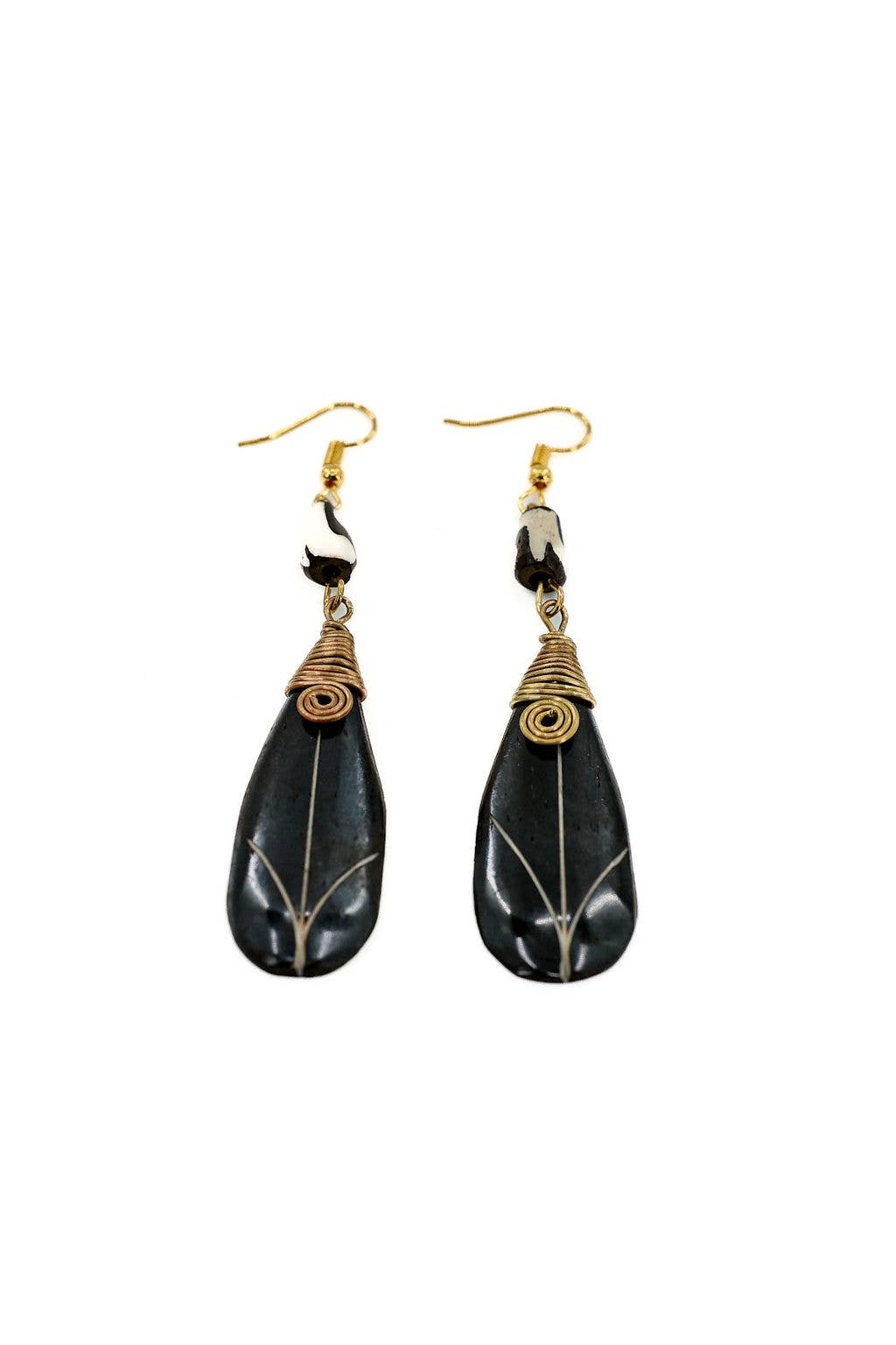 Eco-conscious fair trade earrings featuring hand-batiked up-cycled bone and brass, nickel and lead-free.