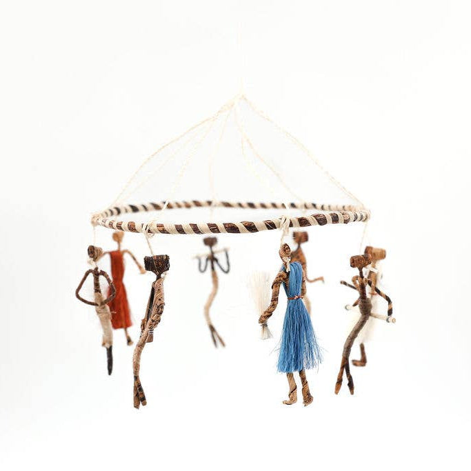 Whimsical fair trade mobile featuring dancers in motion.