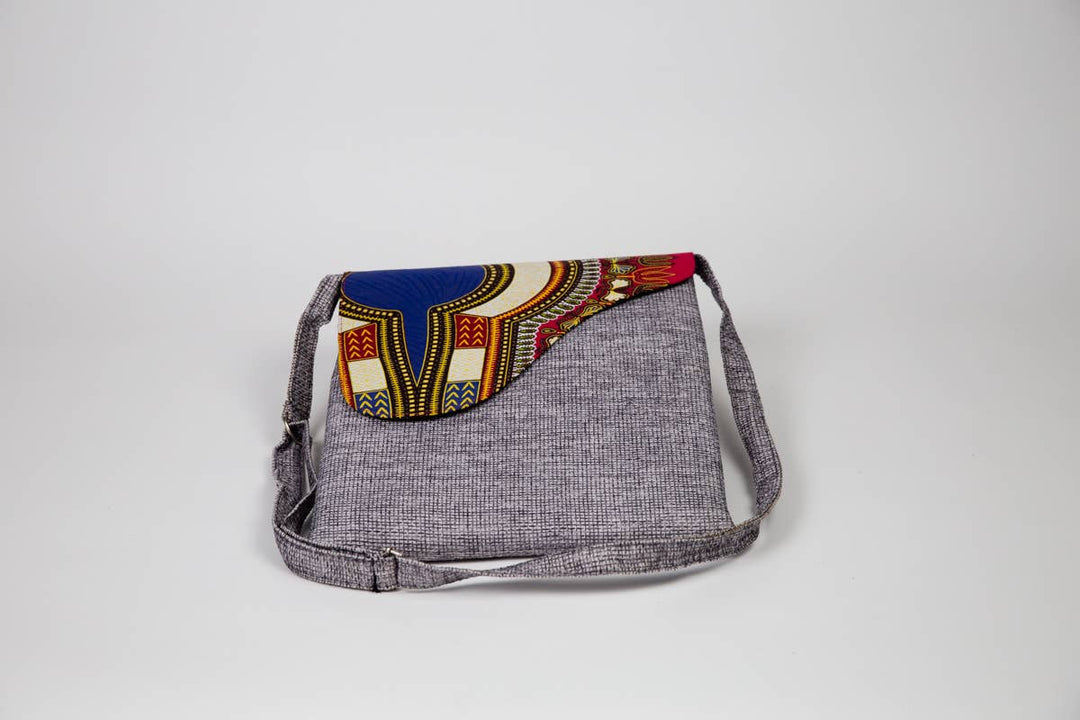 Fair trade shoulder bag made from up-cycled fabric and bold patterns.