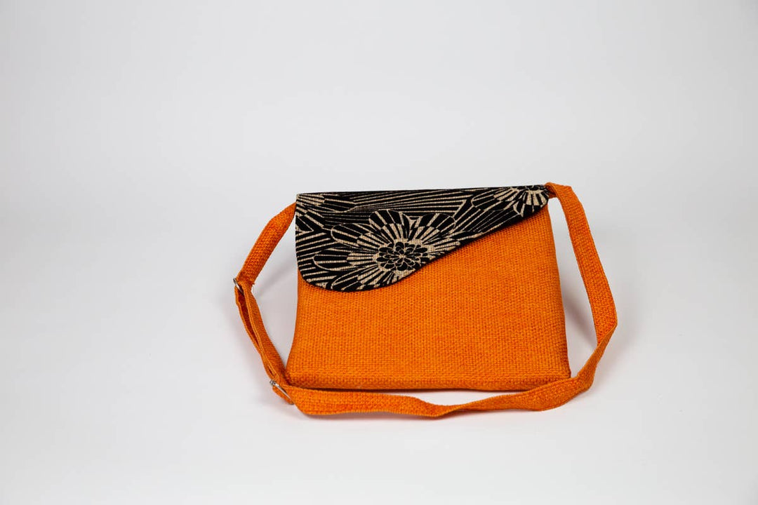 Up-cycled fabric bag that can be styled with any outfit.

