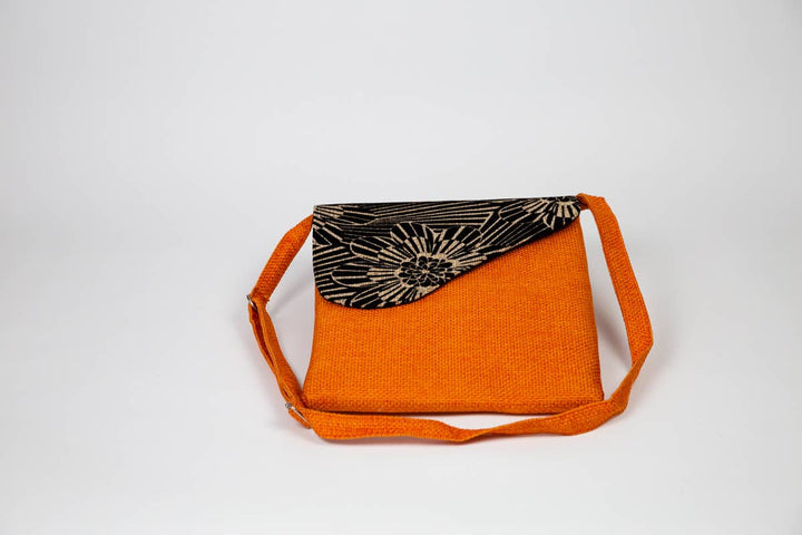 Up-cycled fabric bag that can be styled with any outfit.

