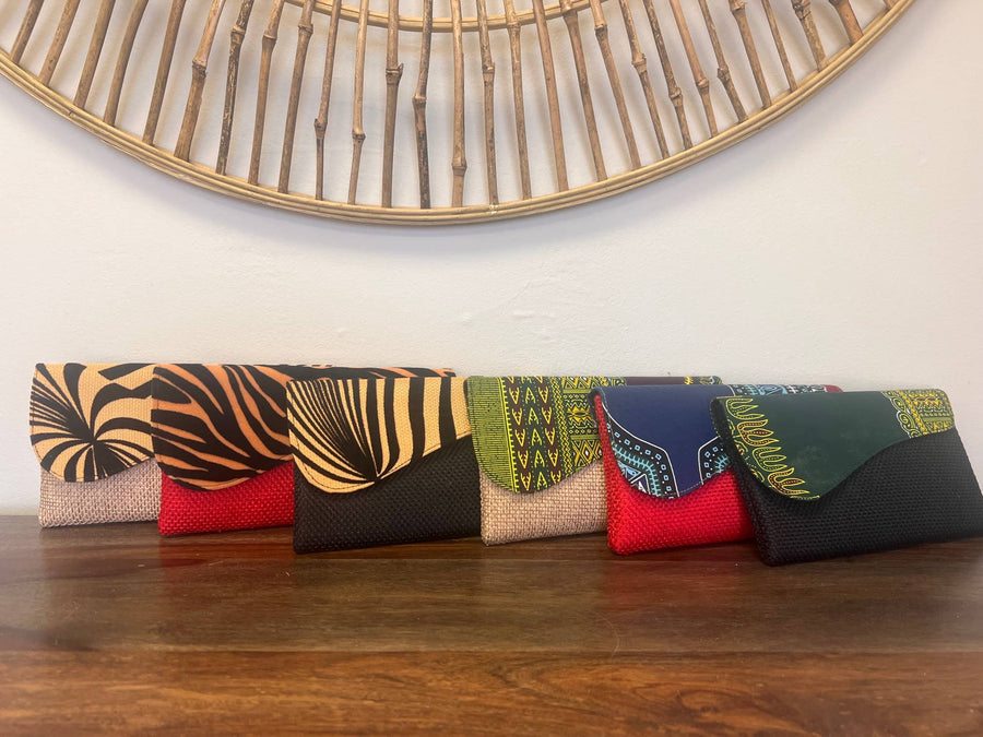 Sustainable African clutch bag crafted with remnant textiles and bold cultural prints.