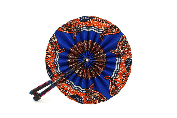 Fairtrade and colorful folding fan made with African print fabric.