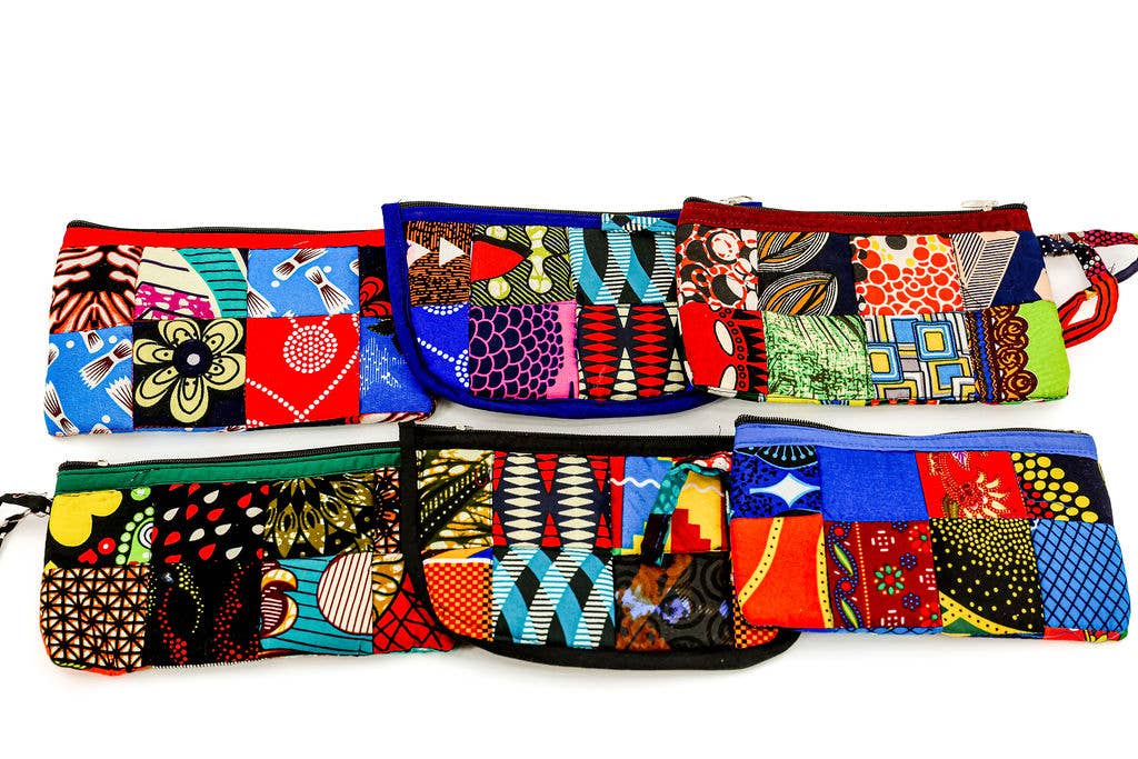 Eco-friendly fair trade patchwork cosmetic bag made from up-cycled fabric with colorful zip closure.