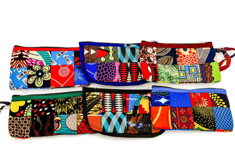 Eco-friendly fair trade patchwork cosmetic bag made from up-cycled fabric with colorful zip closure.