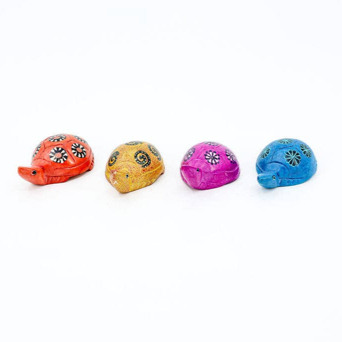 Colorful soapstone turtle in small and large size on display.