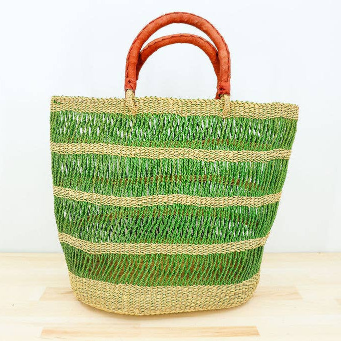 Fair trade vetiver grass market tote with intricate hand-woven pattern.