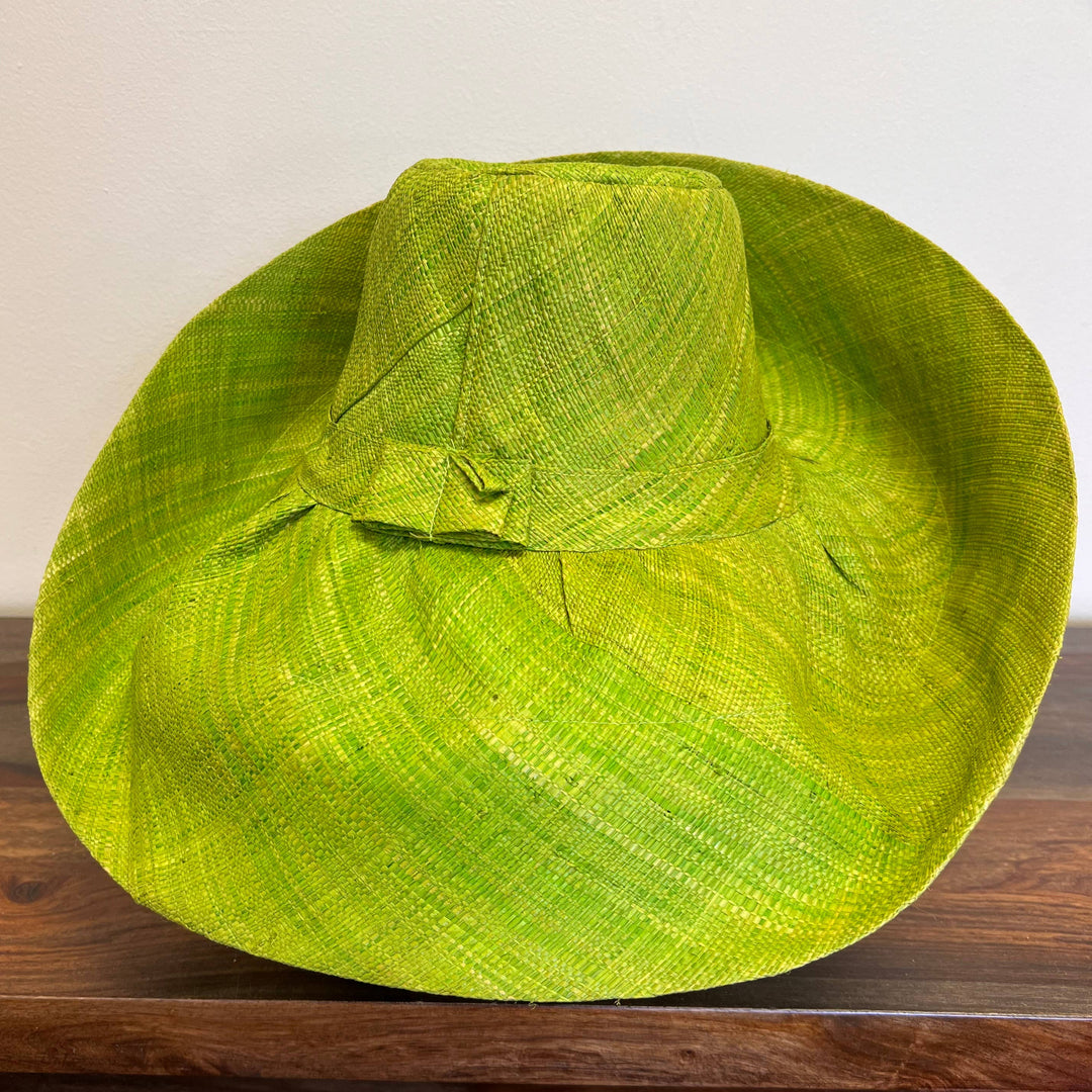 Madagascar artisan raffia hat shown with adjustable interior.