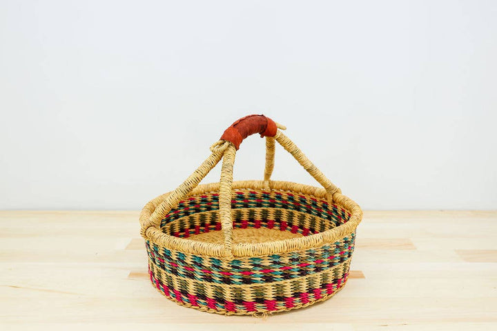 Hand-dyed elephant grass basket with sturdy leather handle, fair trade storage and serving basket