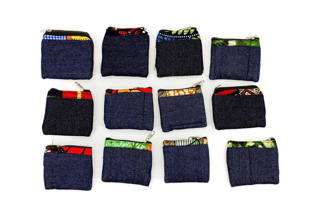 Handcrafted sustainable mini pouch made from recycled denim fabric with zipper top.