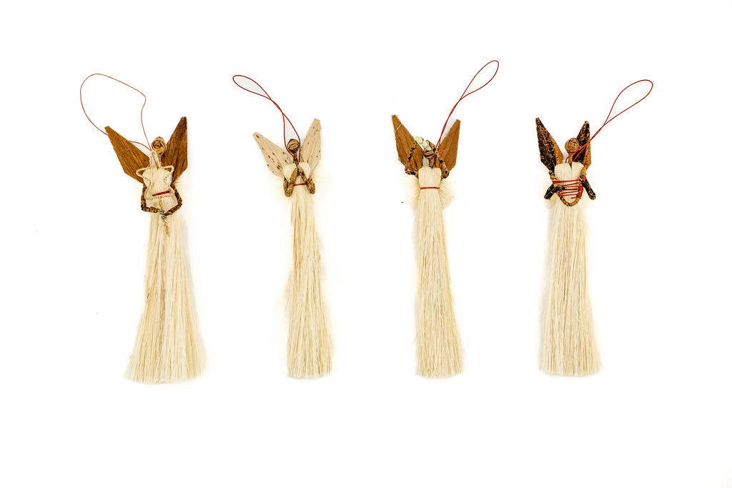 Handmade fair trade Christmas angel ornament crafted from natural banana leaf and sisal fiber, eco-friendly holiday décor supporting artisan communities.