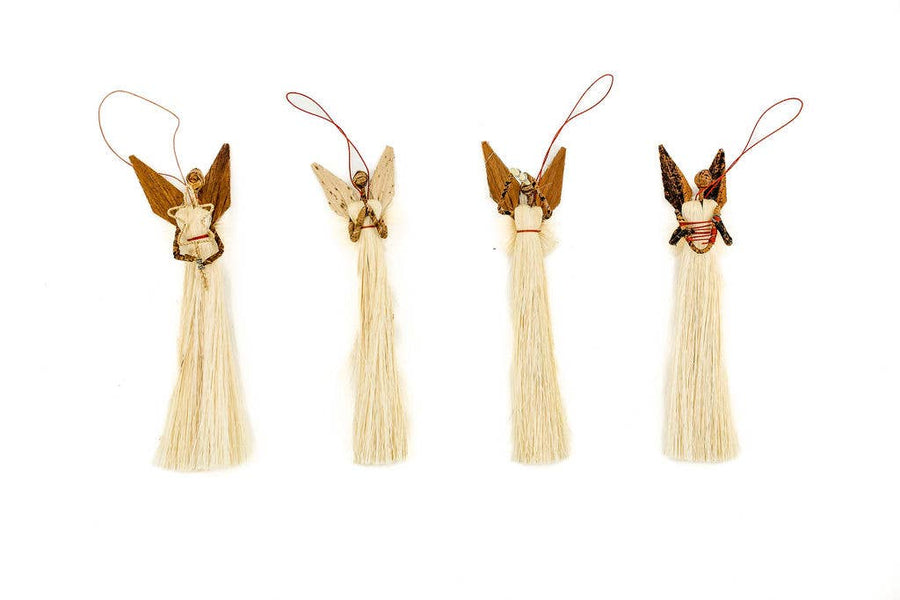 Handmade fair trade Christmas angel ornament crafted from natural banana leaf and sisal fiber, eco-friendly holiday décor supporting artisan communities.