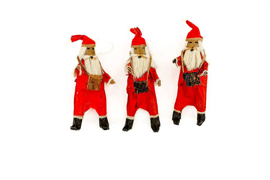 Handmade fair trade Santa Claus Christmas ornament crafted from recycled paper-mâché, eco-friendly holiday décor supporting global artisans.