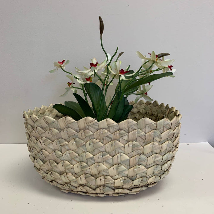 Handwoven Kenyan Kikapu Luo Bowl made from palm and banana leaves, perfect for tabletop or wall décor.
