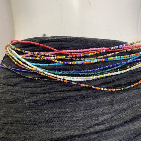 Single-strand waist beads with vibrant bead patterns.
