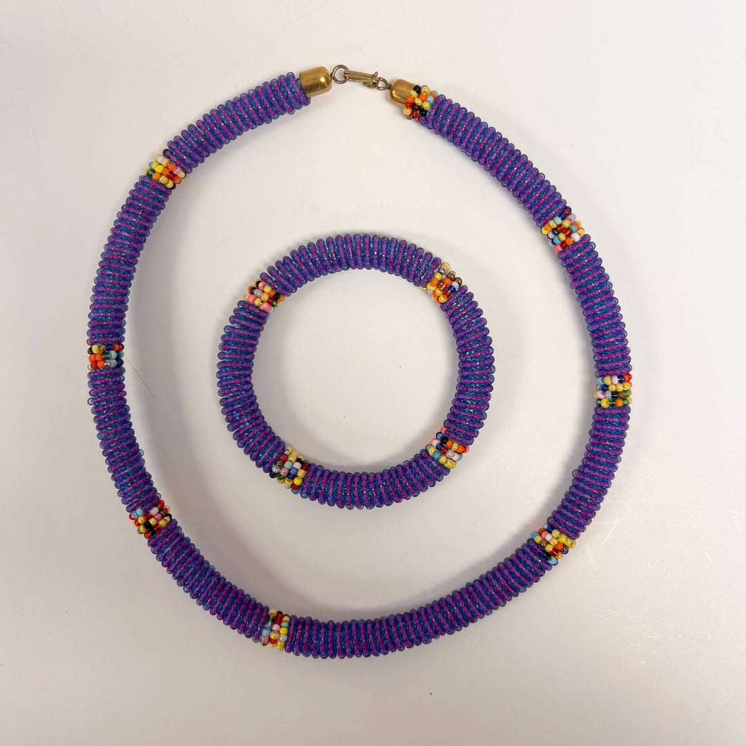 Maasai jewelry with bright glass beads in an assorted color palette.