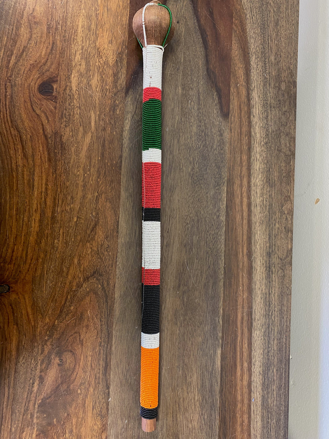 Maasai cultural symbol mace with colorful beads and made in Kenya.