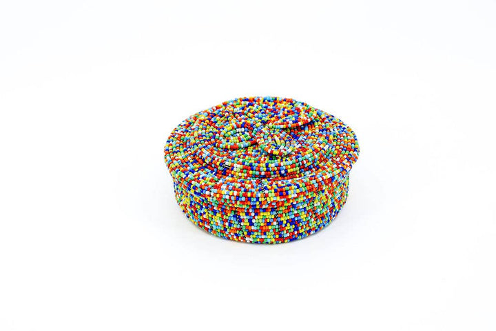 Bright colored mini beaded pot perfect for holding loose change on an entryway table.