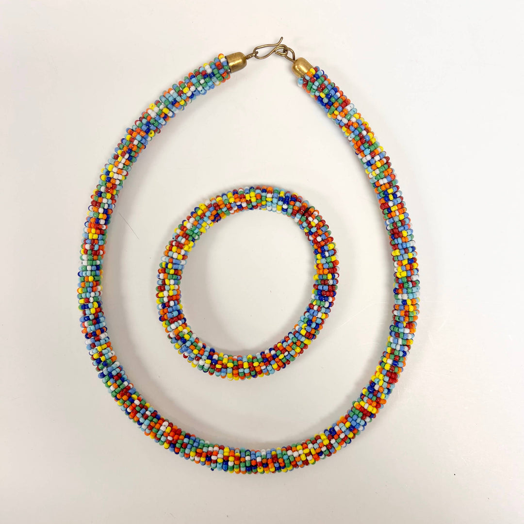 Handmade Maasai bracelet with matching necklace in traditional bead design.