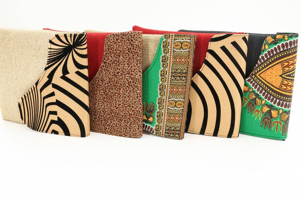 Up-cycled shoulder bag featuring safari animal print design.