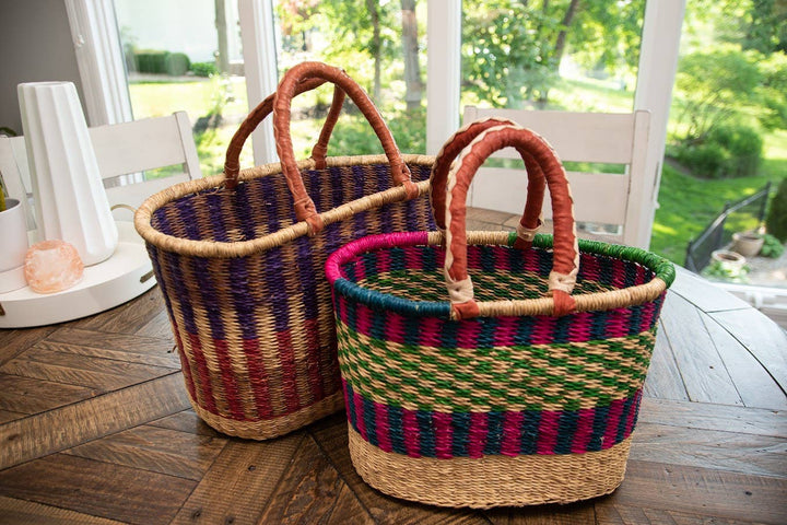 Handwoven Kinkanhe straw basket in vibrant colors.