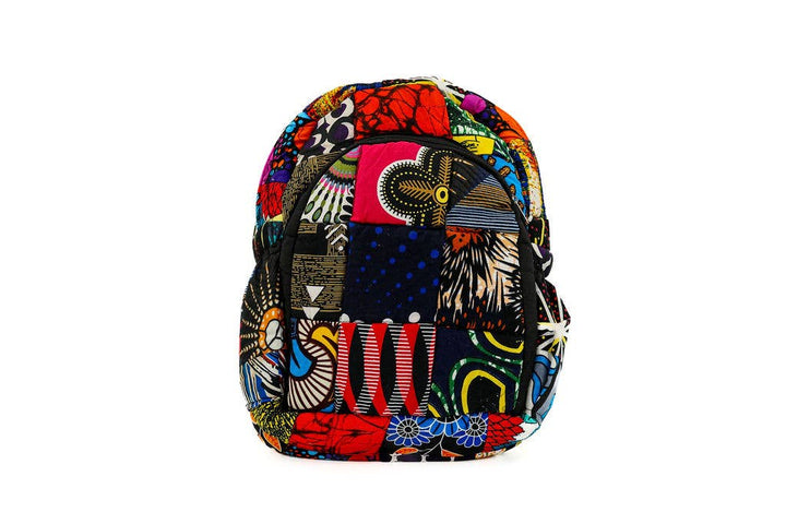 Handmade fair trade pocket patchwork backpack from Kenya, crafted from up-cycled remnant fabric in a vibrant mix of colors and patterns. Features include a secure zipper closure, multiple pockets for storage, and a sustainable, eco-friendly design that supports ethical artisan craftsmanship.
