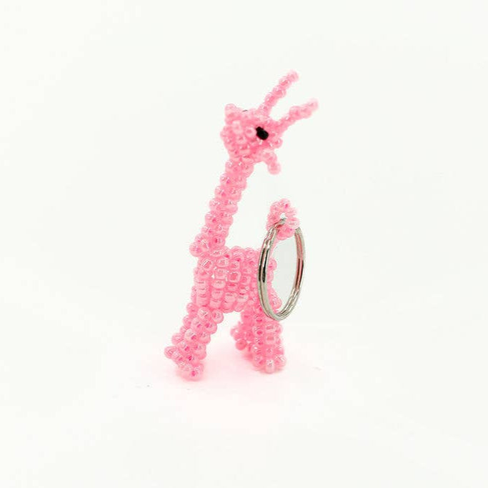 Playful pink giraffe beaded keyring made with small glass beads, great as a gift or party favor.
