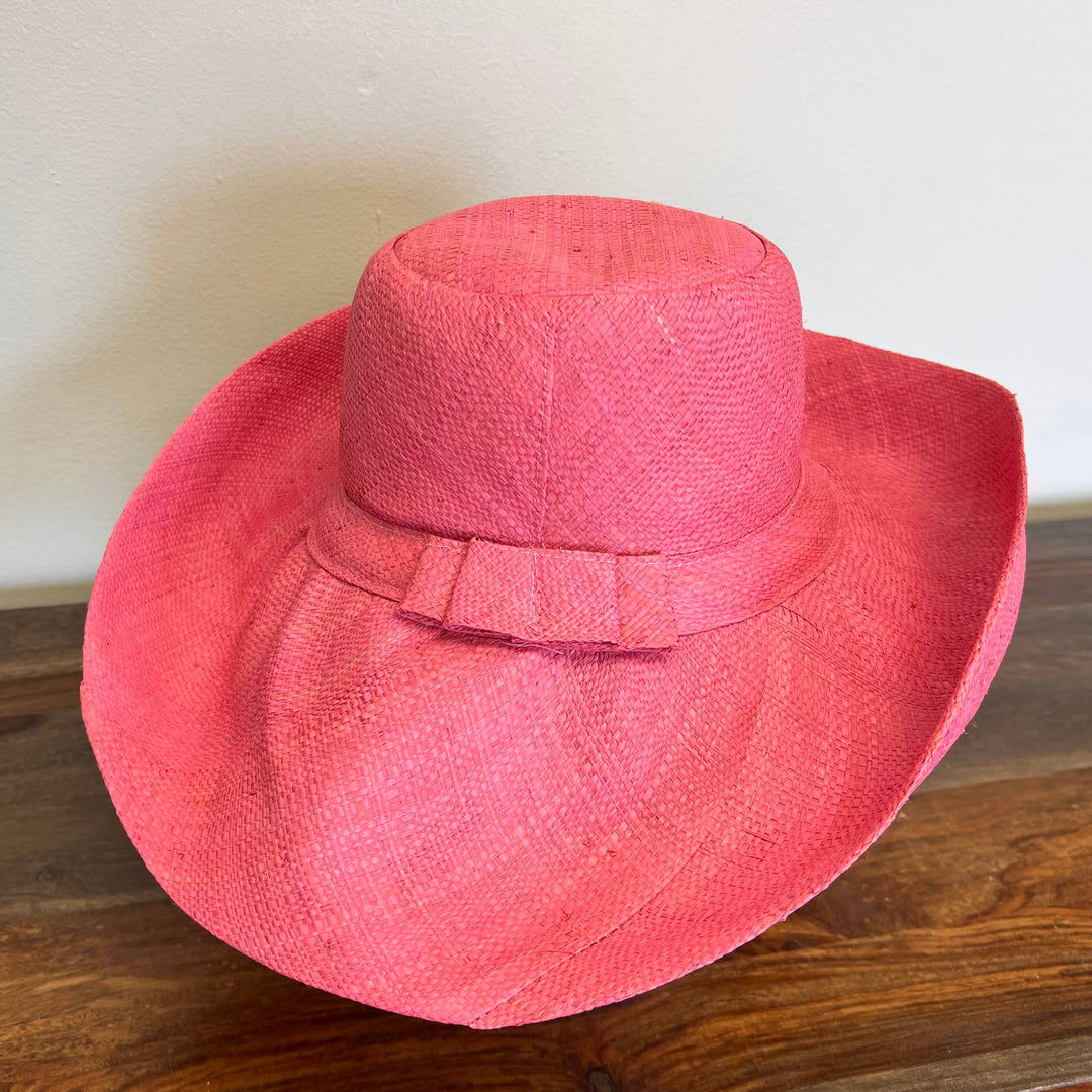Summer-style raffia sun hat handwoven by skilled artisans.